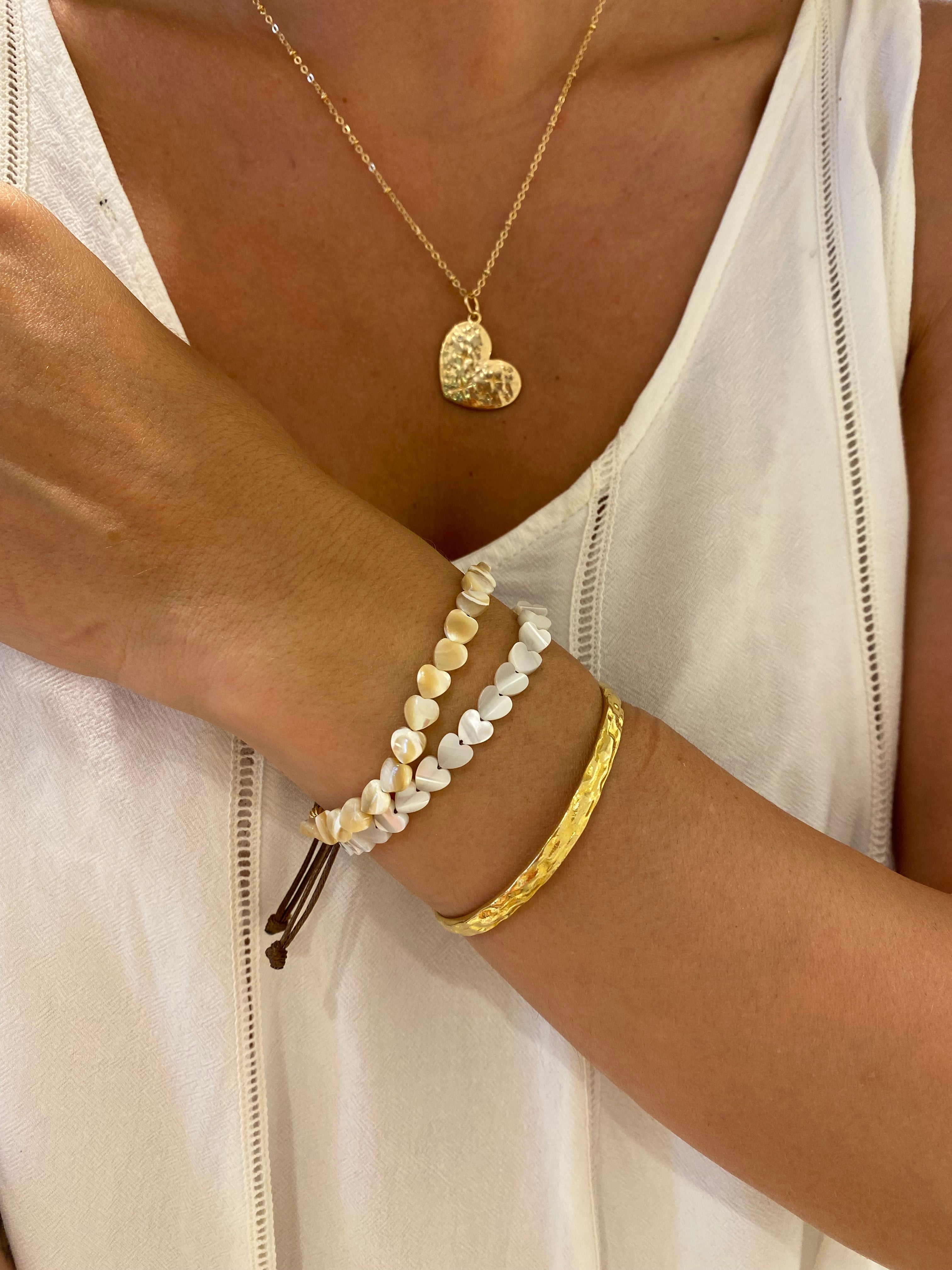 PULSEIRA CORAÇÕES DE PROTEÇÃO OURO