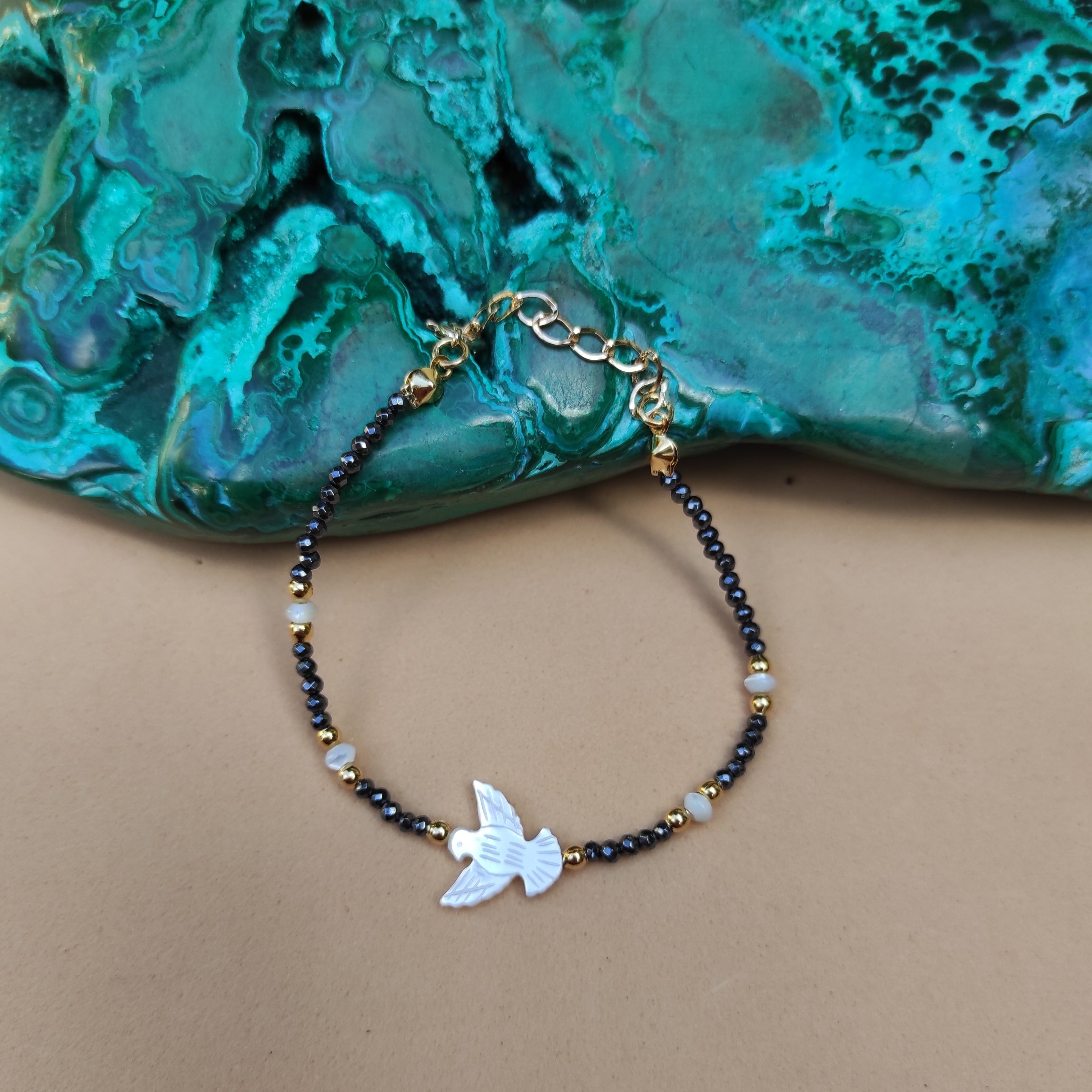 PULSEIRA PAZ MADREPÉROLA HEMATITA OURO
