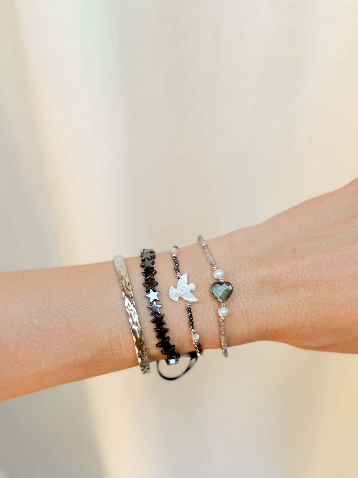 PULSEIRA ESTRELAS DE HEMATITA RODIO