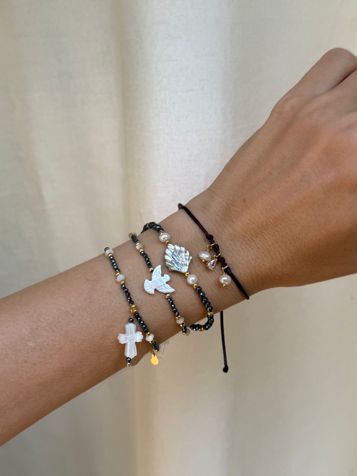 PULSEIRA CRUZ MADREPÉROLA HEMATITA OURO